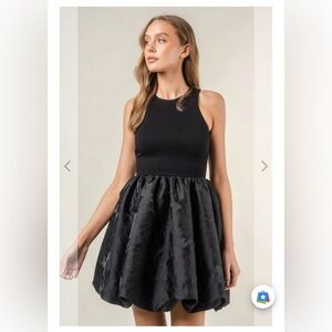 Black Bubble Hem Mini Dress
Size M